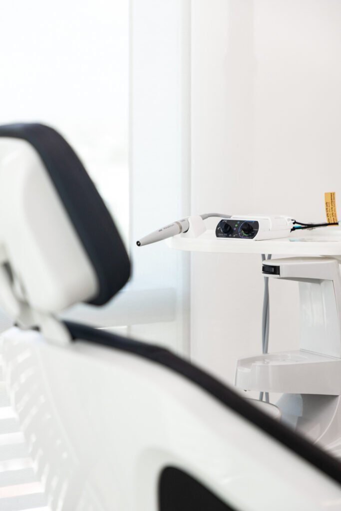 Smiling child receiving a fun and comfortable dental checkup at Vanity Aesthetics in Cancun."