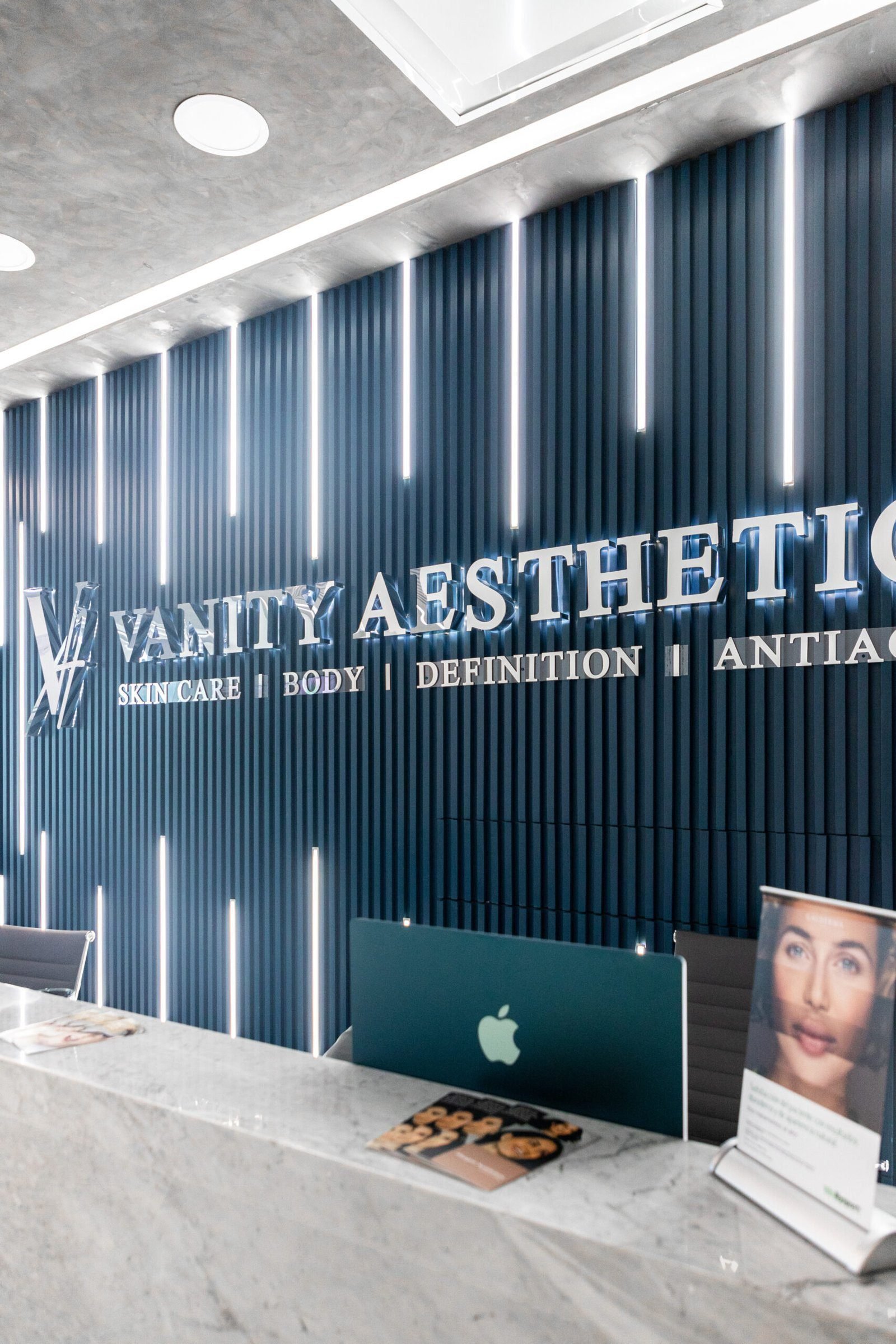 The modern and inviting lobby of Vanity Aesthetics clinic, featuring comfortable seating and stylish decor.