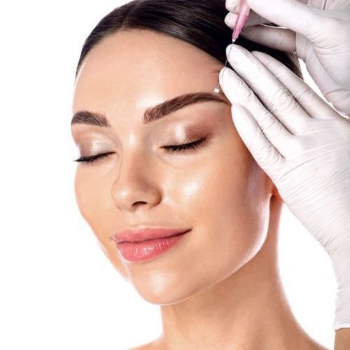 A patient undergoing a thread lift procedure for a non-surgical face lift.